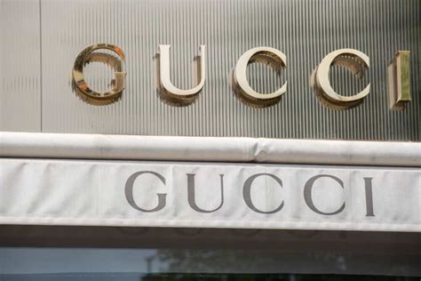 gucci brand owner|gucci is owned by.